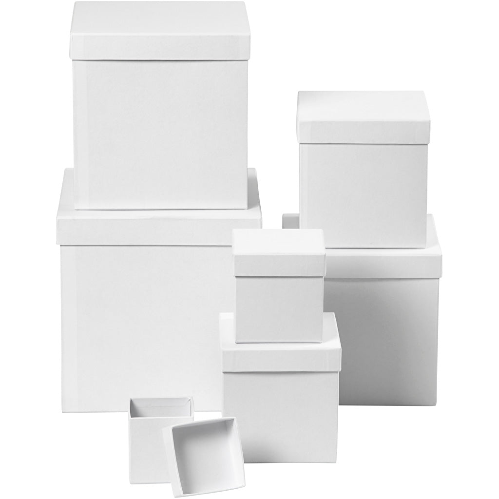 Square, hand-made boxes of papier-mâché