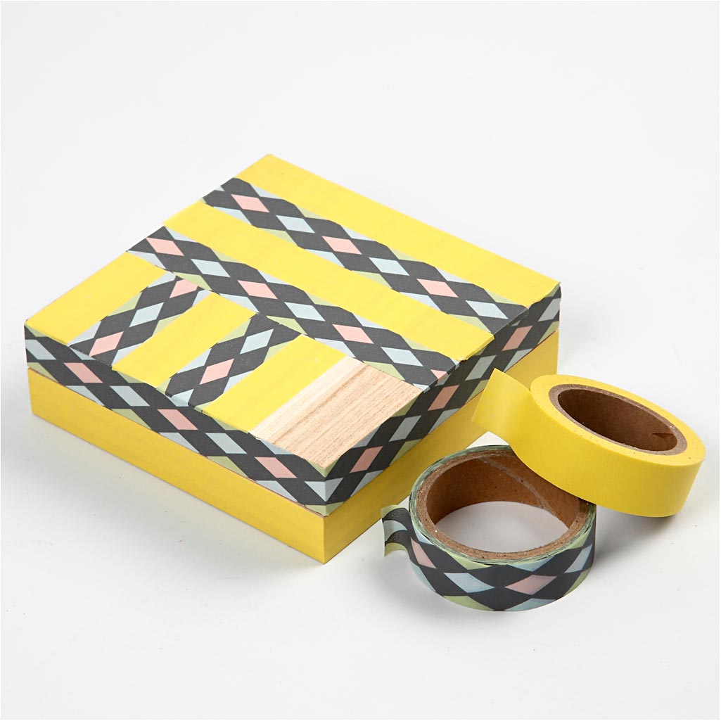 Wooden box in light wood with a loose lid .