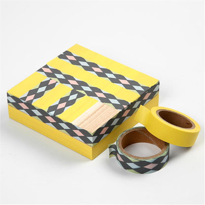 Wooden box in light wood with a loose lid .